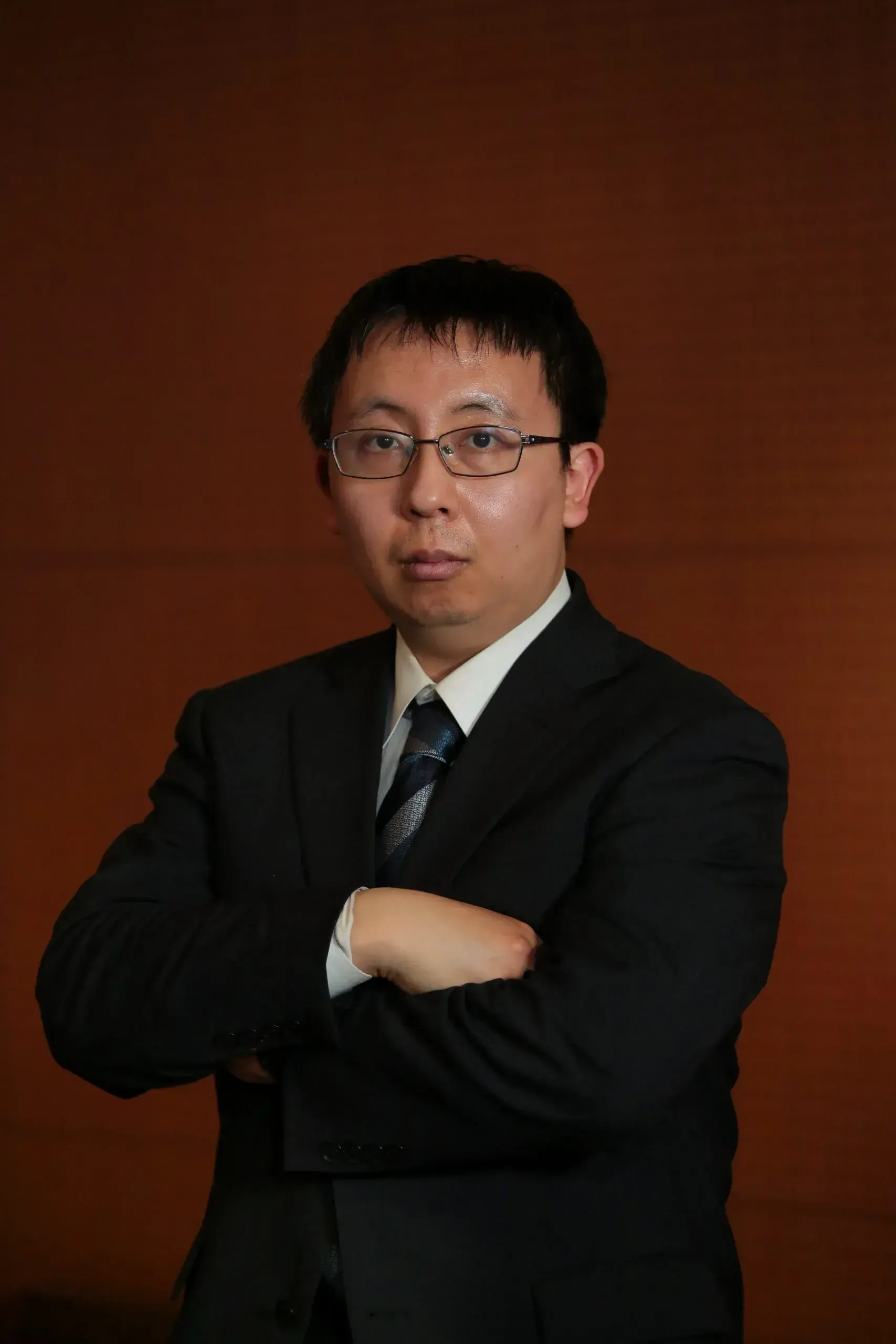 専修大学経済学部教授 小川健